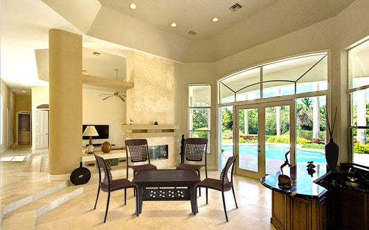 The image depicts a stylish and modern living room that showcases several pieces of plastic furniture